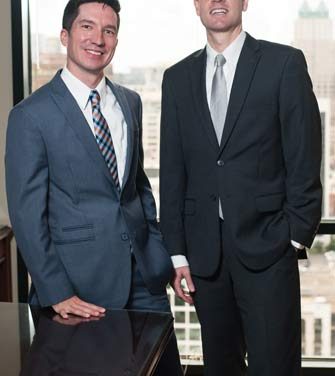 Shawn T. Jewell  & Eric R. Elms | Fisher Rushmer, P.A.